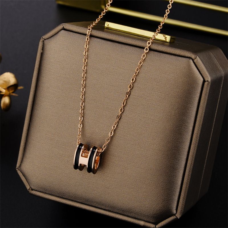 ROMAN DRUM COPPER PLATED STAINLESS STEEL NECKLESS